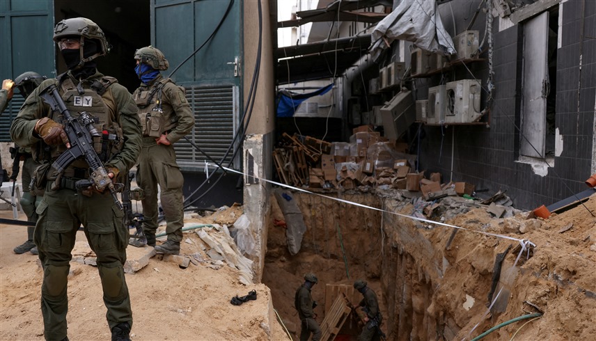 قوات الجيش الإسرائيلي أثناء تدمير نفق تابع لحماس في وقت سابق (رويترز) 