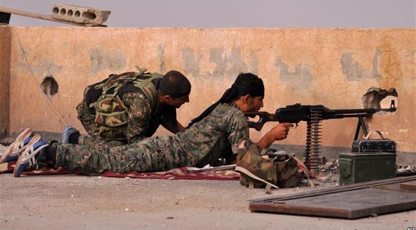 مقاتلين أكراد خلال اشتباكات في القامشلي (أرشيف)