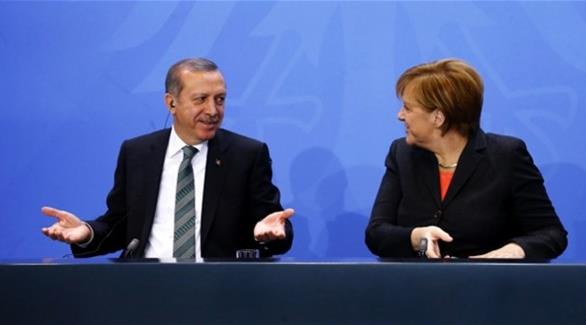 المستشارة الألمانية أنغيلا ميركل والرئيس التركي رجب طيب إردوغان (أرشيف)