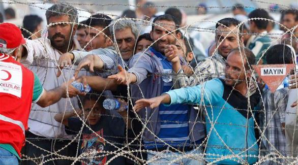 لاجئون عالقون بالقرب من الحدود التركية (أرشيف) 
