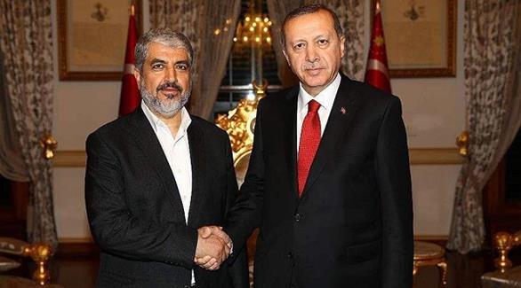 الرئيس التركي رجب طيب أردوغان ورئيس المكتب السياسي لحركة حماس خالد مشعل (أرشيف)