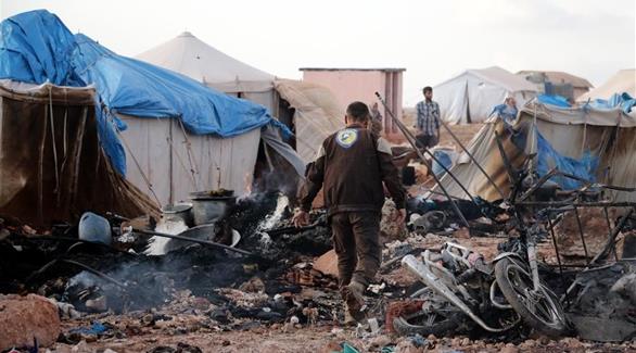 آثار قصف على مخيم للنازحين في بغداد (أرشيف)