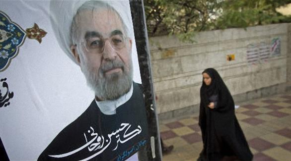 صورة للرئيس الإيراني حسن روحاني بأحد شوراع طهران (أرشيف)