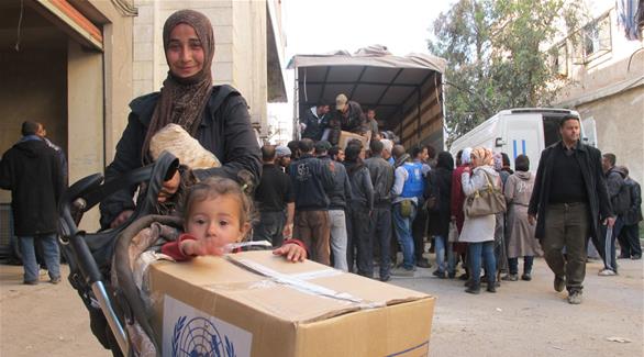 سوريون بانتظار الحصول على المساعدات من الأمم المتحدة (أرشيف)