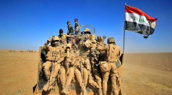 عناصر من الجيش العراقي فور انطلاق معركة الموصل (أ ف ب)