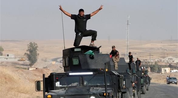 قوات خاصة عراقية قرب برطلة (رويترز)