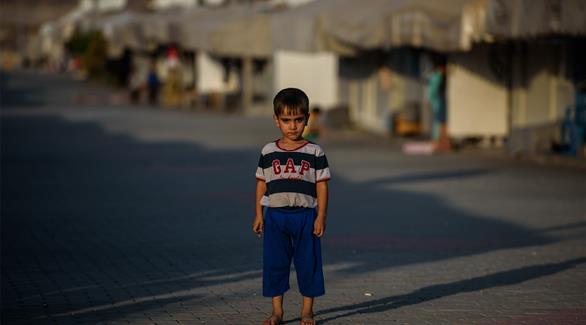 طفل سوري لاجئ في مخيم كيليس جنوب تركيا (أ ف ب)