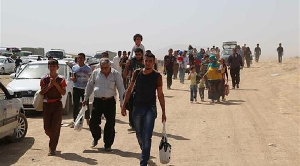 عشرات العراقيين الفارين من الموصل (أرشيف)