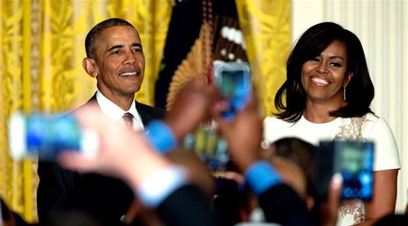الرئيس الأمريكي المنتهية ولايته باراك أوباما وزوجته ميشيل (أرشيف)