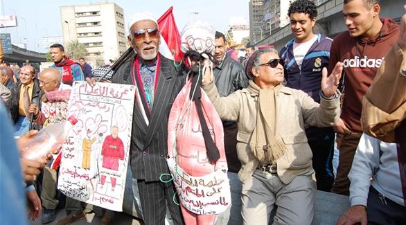 مصريون يطالبون بإعدام محمد مرسي في بداية الاحتفال بثورة 25 يناير(تصوير: رمضان إبراهيم)