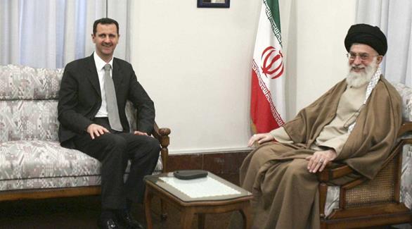 صورة من إحدى زيارات الأسد إلى إيران