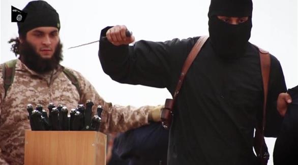 عناصر من داعش في إحدى عمليات الذبح (أرشيف)