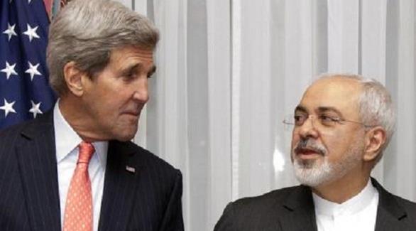وزير الخارجية الأمريكي جون كيري ووزير الخارجية الإيراني محمد ظريف (أ ف ب)