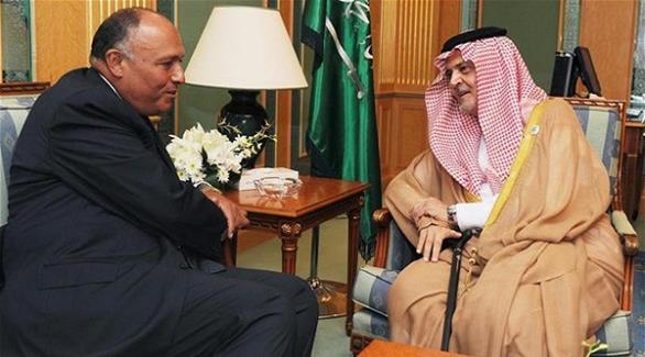 وزير الخارجية السعودي الأمير سعود الفيصل  مع نظيره المصري سامح شكري (أرشيف)
