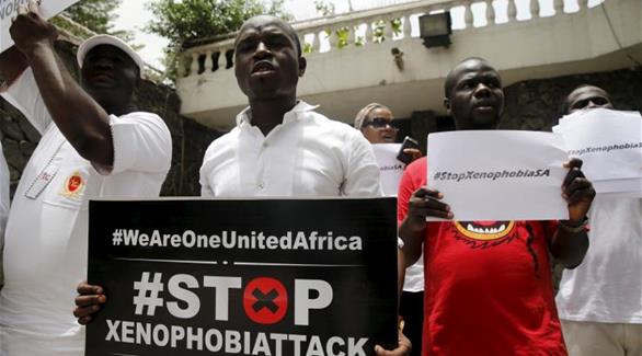 نيجيريون يتظاهرون ضد تعامل جنوب أفريقيا مع الأجانب(رويترز)