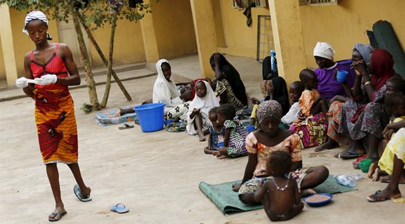 جانب من النساء والأطفال الذين أنقذهم الجيش النيجيري أخيراً من براثن بوكو حرام(رويترز)