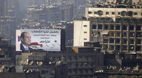 لوحة إعلانية عن الرئيس السيسي على سطوح مصر