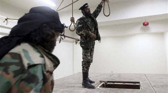مقاتلون من الجيش السوري الحر داخل سجن دركوش المحرر (غيتي)