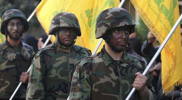 عناصر تابعة لحزب الله في أحد العروض العسكرية (أ ب)
