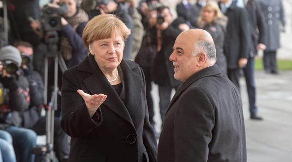 المستشارة الألمانية أنجيلا ميركل ورئيس الوزراء العراقي حيدر العبادي (أرشيف)
