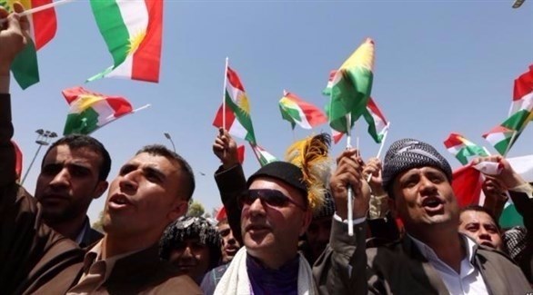 أكراد يحتفلون بنتائج الاستفتاء على الاستقلال. (أرشيف)
