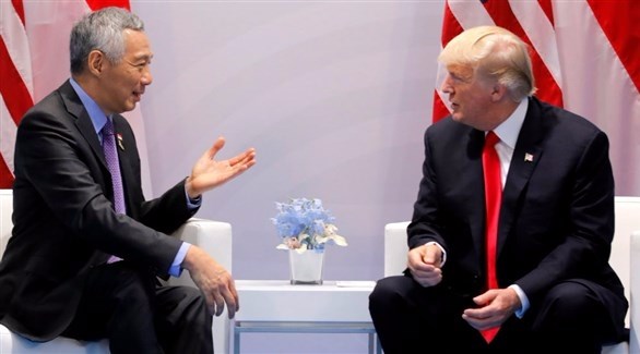 الرئيس الأمريكي دونالد ترامب ورئيس وزراء سنغافورة لي هسين (أرشيف)