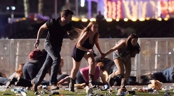 شباب يهربون من مكان الاحتفال خلال هجوم لاس فيغاس.(أرشيف)