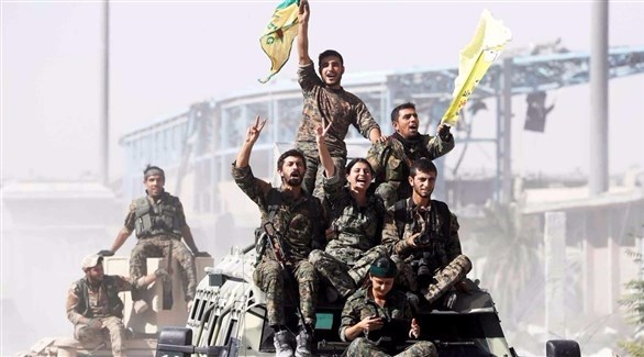 مقاتلون من وحدات حماية الشعب الكردية.(أ{شيف)