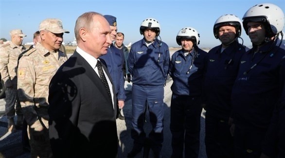 بوتين يزور قوات بلاده في سوريا (إ ب أ)
