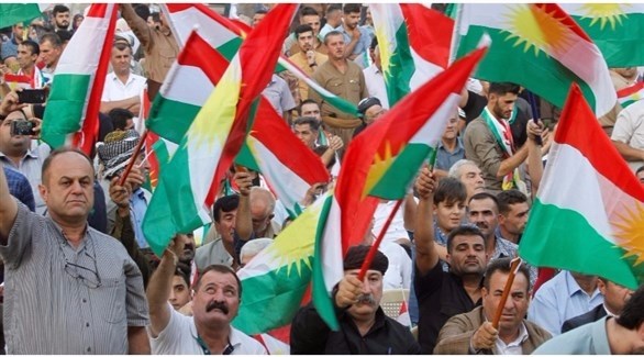 أكراد عراقيون يتظاهرون احتفالاً بنتائج الاستفتاء على الاستقلال.(أرشيف)