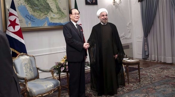 الرئيس الإيراني حسن روحاني مستقبلاً الرجل الثاني في كوريا الشمالية كين يونغ نام.(أرشيف)