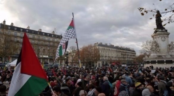  متظاهرون في باريس رفضاً لقرار ترامب الاعتراف بالقدس عاصمة لإسرائيل في التاسع من ديسمبر (أ ف ب)