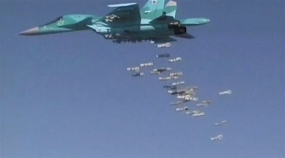 قاذفة روسية يعتقد أنها انطلقت من قاعدة همدان الإيرانية تلقي قنابل على مواقع لداعش في سوريا.(أرشيف)