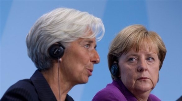 المستشارة الألمانية أنجيلا ميركل ورئيسة صندوق النقد الدولي كريستين لاغارد (أرشيف)