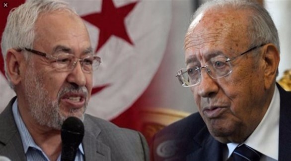 الرئيس التونسي الباجي قايد السبسي وزعيم حركة النهضة راشد الغنوشي.(أرشيف)