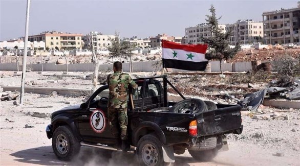 آلية لجيش الأسد في أحد الشوارع السورية (أرشيف / أ ف ب)