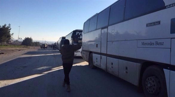 حافلات لنقل مسلحي المعارضة السورية وعائلاتهم من حي الوعر إلى إدلب (أرشيف)