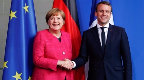 الرئيس الفرنسي ماكرون والمستشارة الألمانية ميركل (أرشيف)