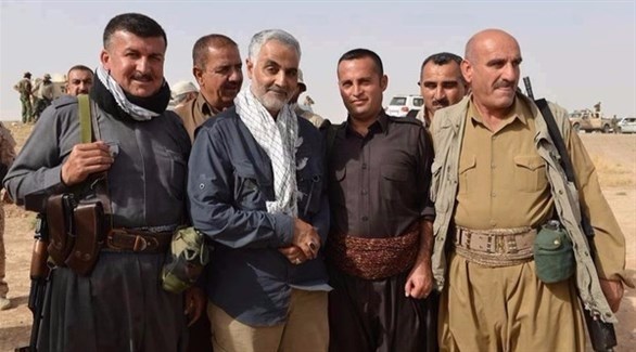 قائد فيلق القدس قاسم سليماني مع مقاتلين في العراق.(أرشيف)