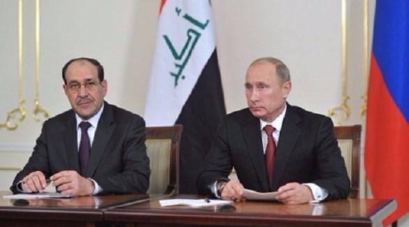 الرئيس الروسي بوتين ونائب الرئيس العراقي المالكي (أرشيف)