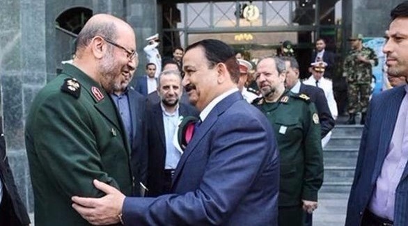 وزير الدفاع العراقي عرفان الحيالي ونظيره الإيراني حسين دهقان (أرشيف)