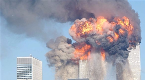 النيران تتصاعد من برجي مركز التجارة العالمي في نيويورك.(أرشيف)