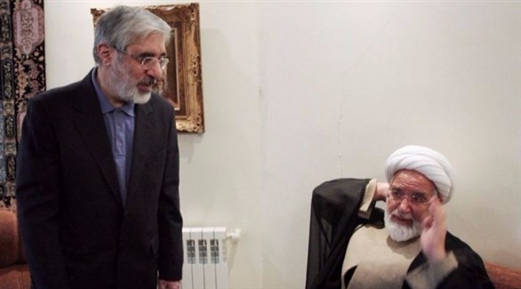مير حسين موسوي ومهدي كروبي (أرشيف / رويترز)
