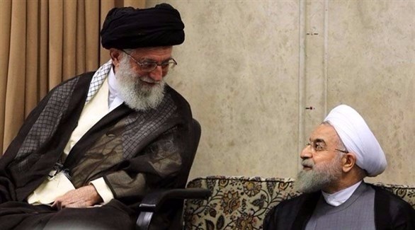 رئيس مجلس خبراء القيادة أحمد جنتي والرئيس الإيراني حسن روحاني (أرشيف)