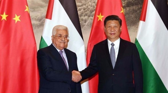 الرئيس الصيني شي جين بينغ والرئيس الفلسطيني محمود عباس (أرشيف)