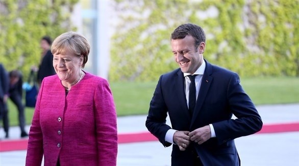 المستشارة الألمانية أنجيلا ميركل والرئيس الفرنسي إيمانويل ماكرون (أرشيف)
