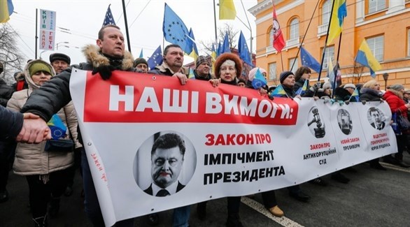مظاهرون أوكرانيون يطالبون برحيل الرئيس بوروشينكو (إي بي إيه)