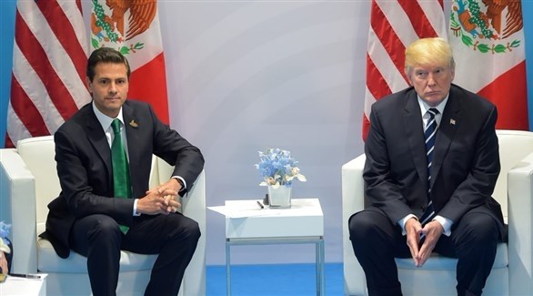  الرئيس الأمريكي دونالد ترامب ونظيره المكسيكي انريكي بينيا نييو (أرشيف)