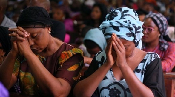 نيجيريات يتضرعن لله بعد خطف طالبات شيبوك قبل أربعة أعوام (أرشيف)