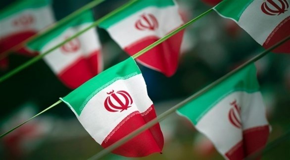 أعلام إيرانية (رويترز)